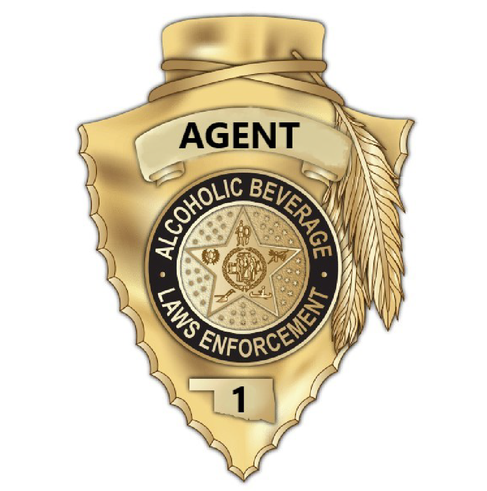 gold arrowpoint with text "agent" "alcoholic beverage laws enforcement" "1"