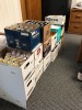 cases of beer and liquor bottles in cardboard boxes