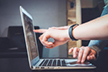 sreb-cte-resources-image A person pointing at the screen of a laptop