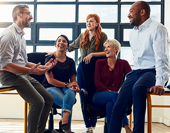 externships02 Shot of a group of designers having a discussion in an office