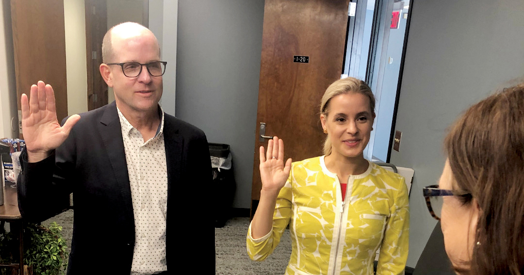Peter Dillingham, left, and Shaelynn Haning, center, are sworn in to the CareerTech state board by Interim State Director Lee Denney, right.