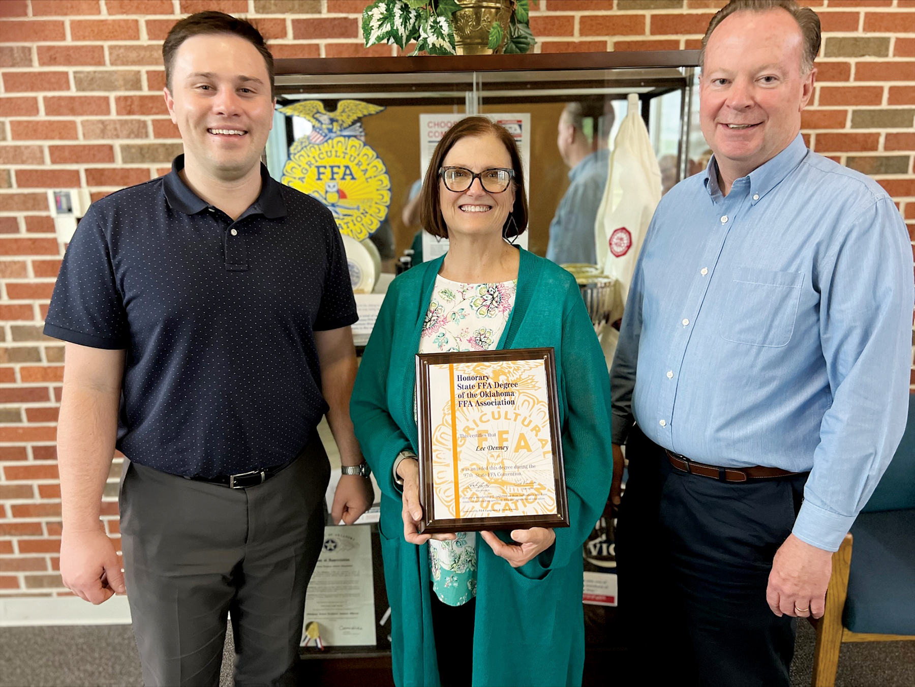 Lee Denney, Oklahoma CareerTech chief of staff and former interim state director, was named an Honorary State FFA Degree recipient at the Oklahoma FFA State Convention. With her are Trevor Lucas, left, state FFA executive secretary, and Scott Nemecek, right, CareerTech agricultural education state program administrator and state FFA adviser.