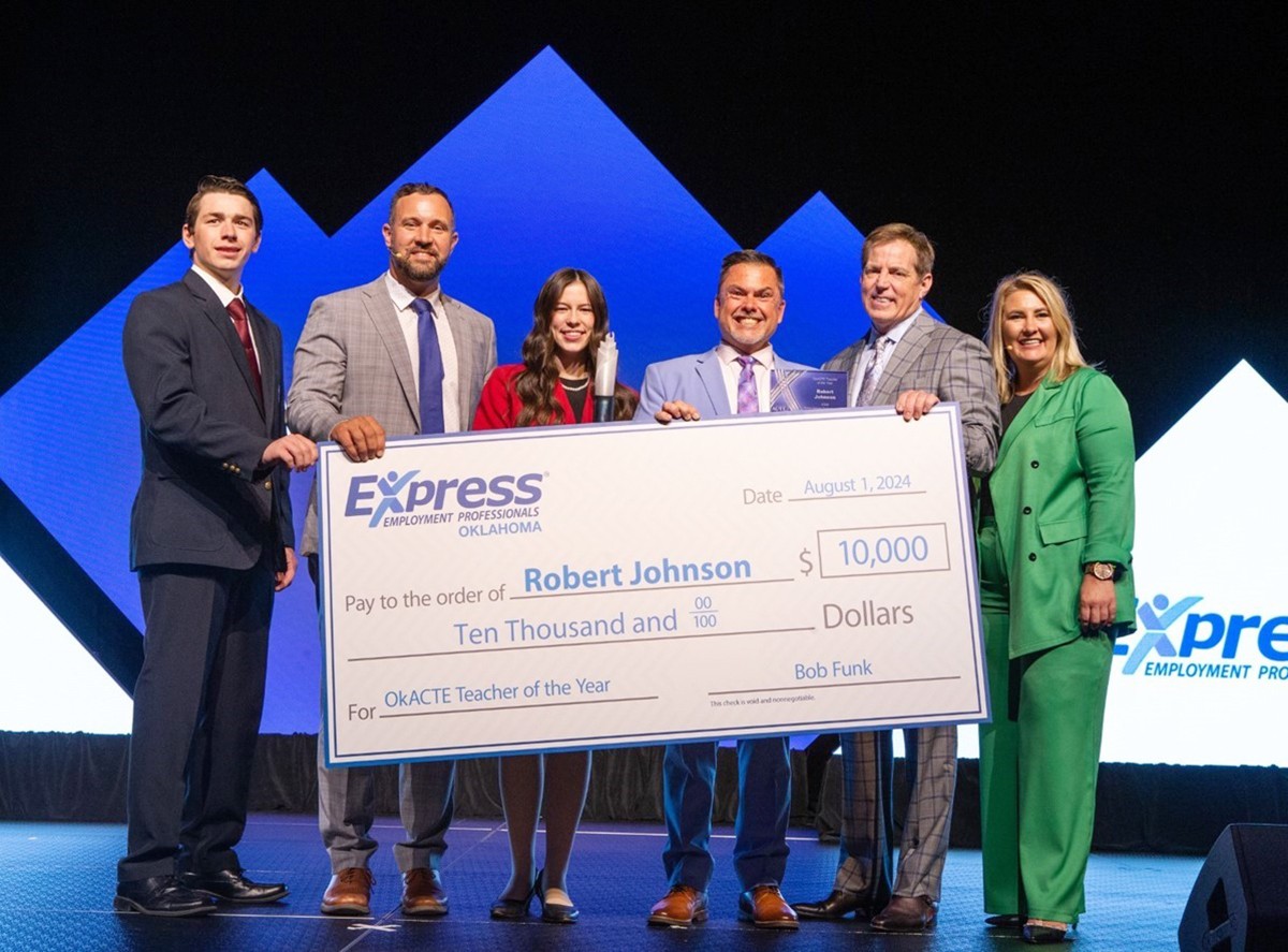 Robert Johnson, pre-engineering instructor at Moore Norman Technology Center, was named OkACTE Teacher of the Year and received a $10,000 cash award made possible by a donation from Bob Funk Sr.