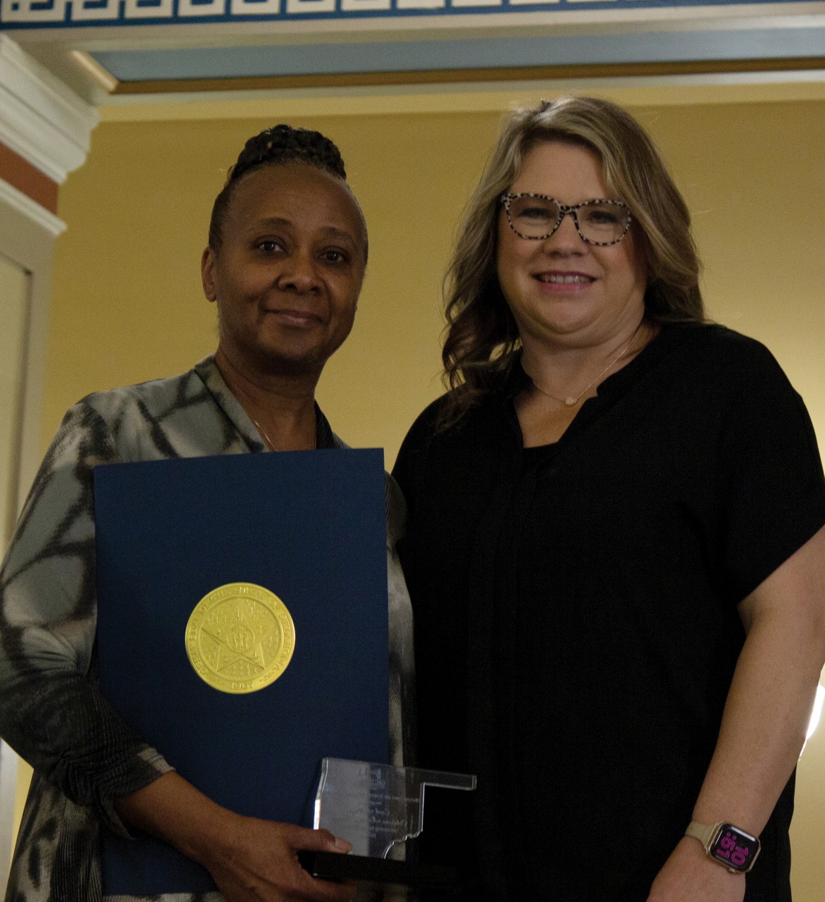 Carol Hinex, left, of the Department of Human Services recently received the Outstanding Community Partner award from the Oklahoma Career and Technical Education Equity Council. With her is Kelly Vinson, OkCTEEC president and director of Project Achieve at Northern Oklahoma College.