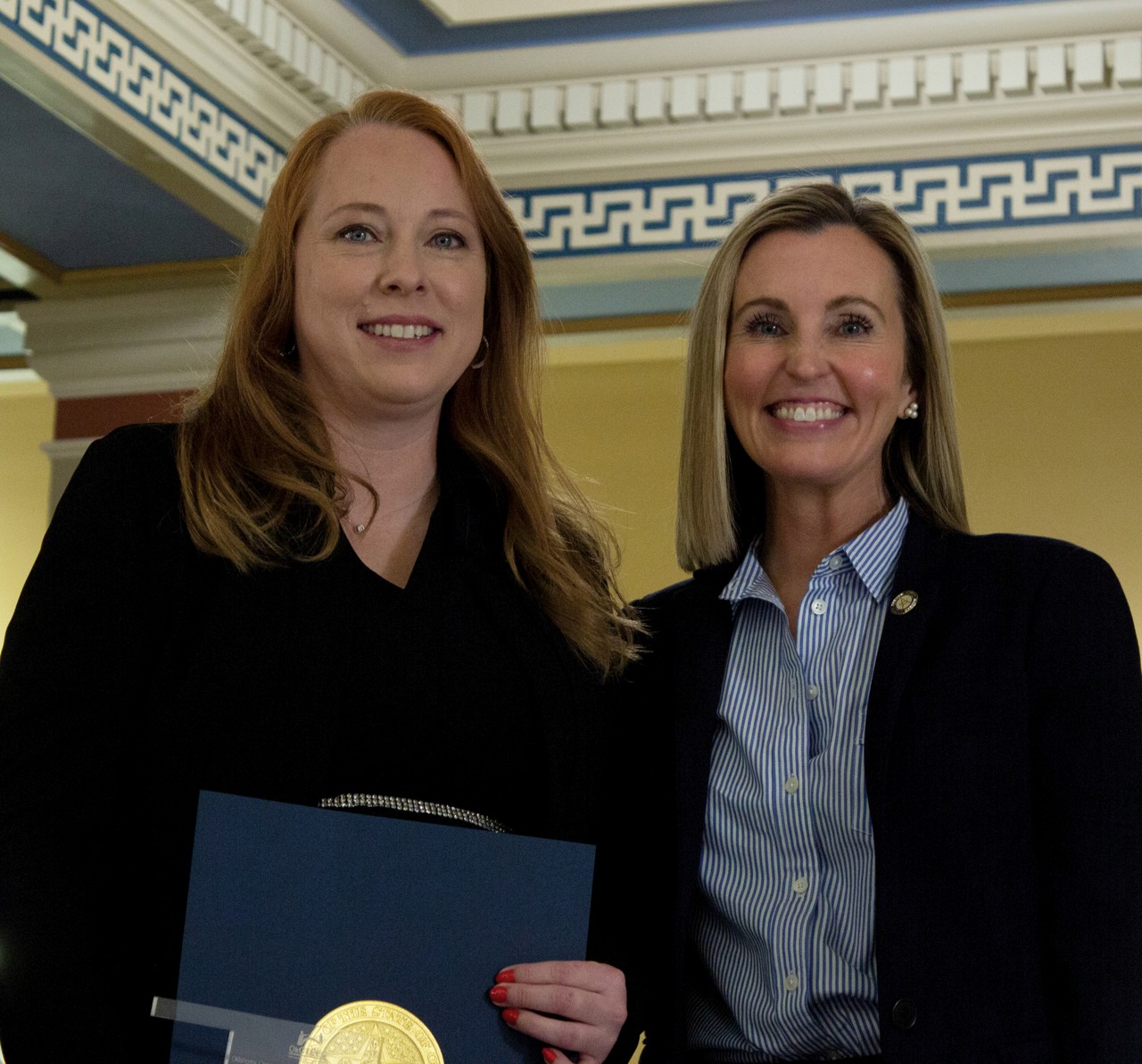 Leslie Pfrehm, left, Moore Norman Technology Center instructor, recently received the Outstanding Instructor award from the Oklahoma Career and Technical Education Equity Council. With her is Sen. Kristen Thompson, R-Edmond.