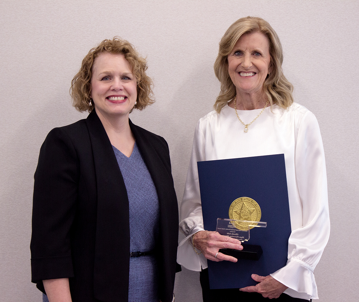 Hope Parenting Ministry of Enid recently received the Outstanding Community Partner/Agency award from the Oklahoma Career and Technical Education Equity Council. Pictured are, Stephanie Beauchamp, left, associate vice chancellor for academic affairs, Oklahoma State Regents for Higher Education, and Glenda Aebi of Hope Parenting Ministry.