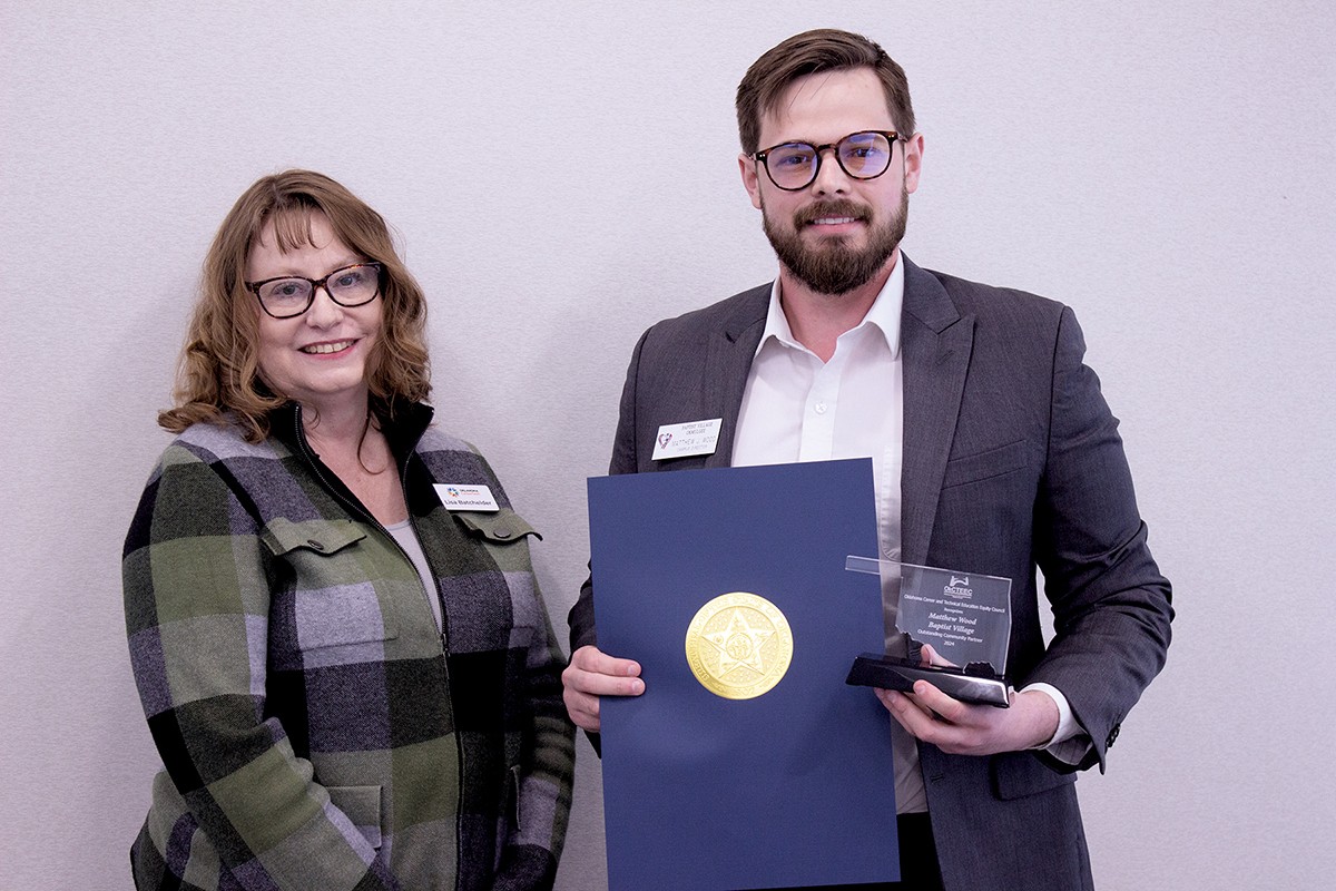 Matthew Wood, campus manager of Baptist Village Communities, recently received the Outstanding Community Partner/Agency award from the Oklahoma Career and Technical Education Equity Council. With him is Lisa Batchelder, chief financial officer at the Oklahoma Department of Career and Technology Education.