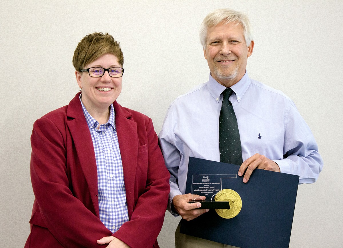 Todd Hendrickson, an instructor at Moore Norman Technology Center, recently received the Outstanding Instructor award from the Oklahoma Career and Technical Education Equity Council. With him is Sondra Shelby, assistant director of adult and family services at Oklahoma Human Services.