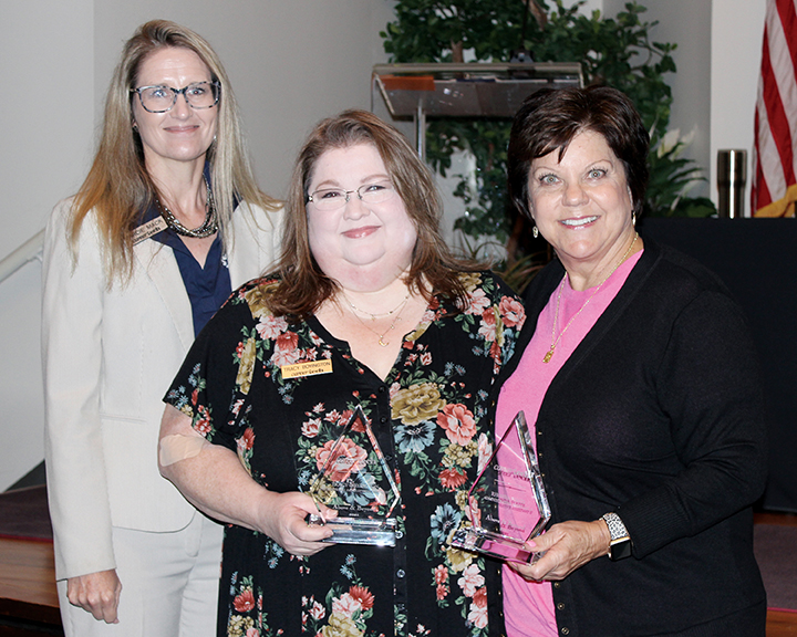 summer-2021-above-and-beyond-award Recipients of the Above and Beyond Pinnacle Award were Tracy Boyington, instructional development specialist in the Resource Center for CareerTech Advancement, center, and Rhonda Foote, health careers education administrative assistant, right. With them is State Director Marcie Mack.