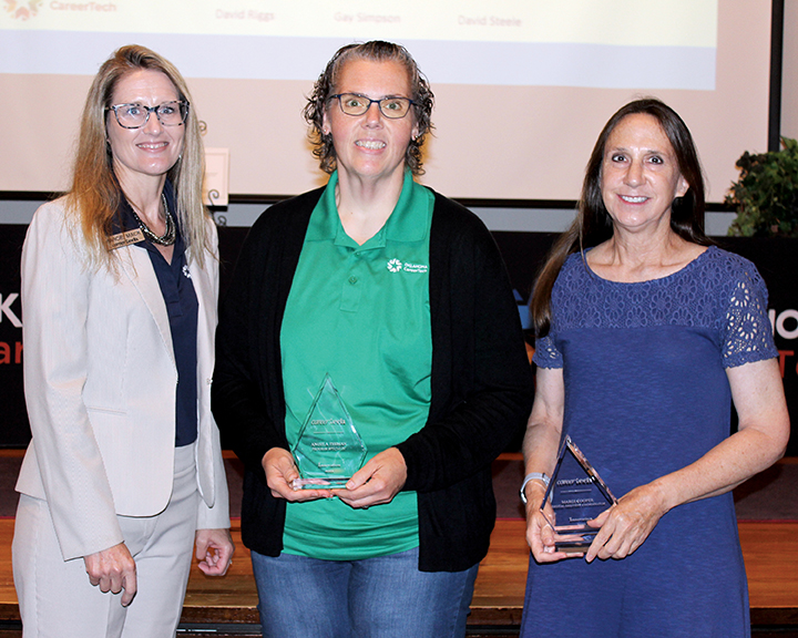 Innovation Pinnacle Award recipients were Angela Teeman, STEM program specialist, center, and Margi Cooper, ctYou.org digital delivery coordinator, right. With them is State Director Marcie Mack.