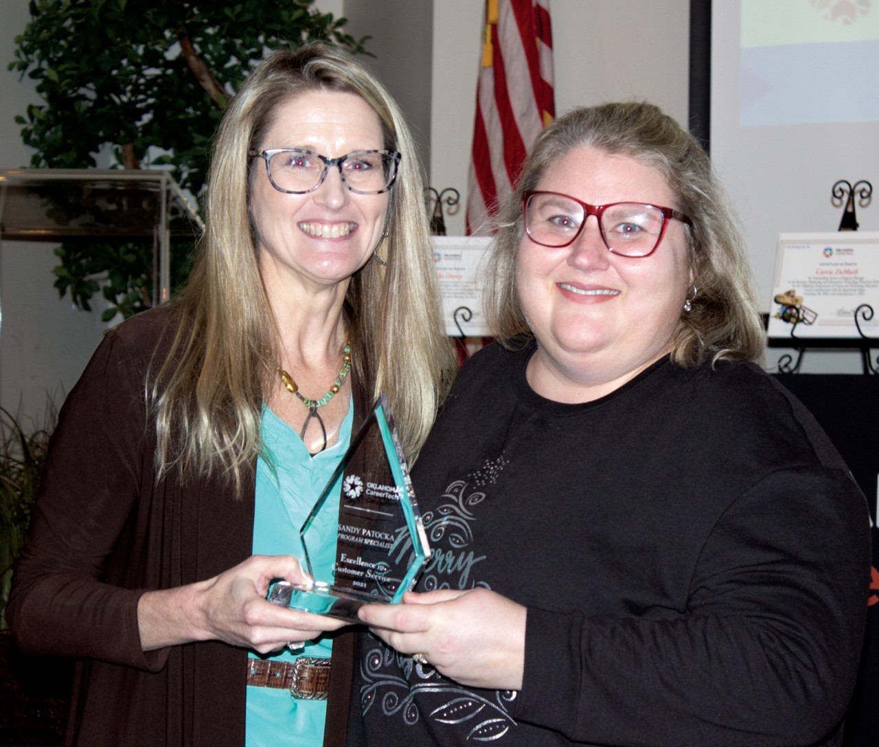 Sandy Patocka, right, received an Excellence in Customer Service Pinnacle Award. With her is Oklahoma CareerTech State Director Marcie Mack.