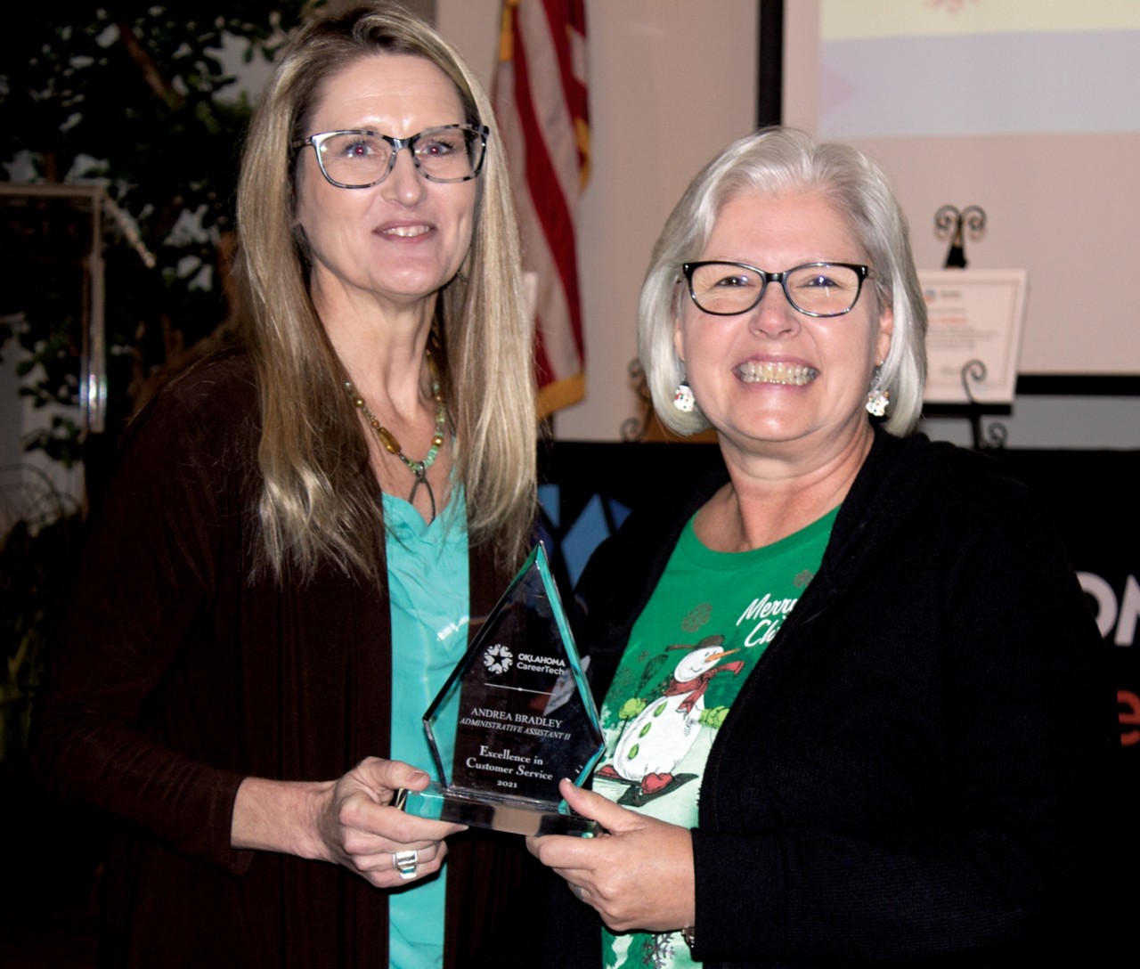Andrea Bradley, right, received an Excellence in Customer Service Pinnacle Award. With her is Oklahoma CareerTech State Director Marcie Mack.