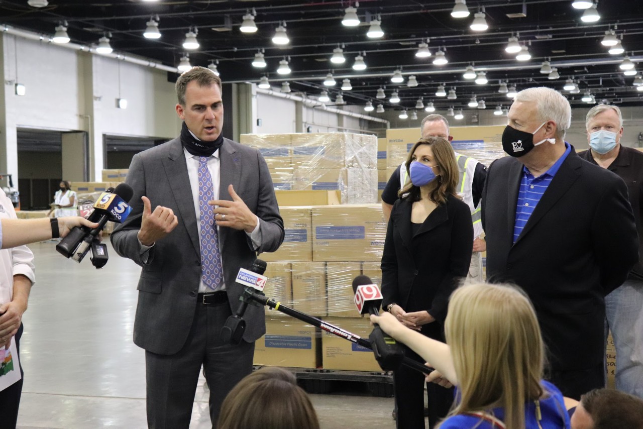 Governor Stitt speaking with the press about PPE supplies