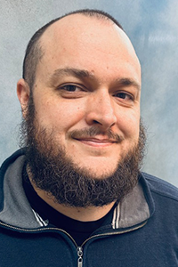 Aaron Hardin is a digital bindery journey worker of the print services division of CareerTech