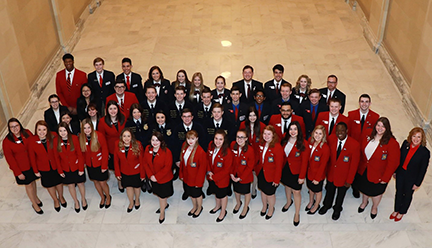 CareerTech student organization officers gather for a photo in a hallway at the Oklahoma Capitol.