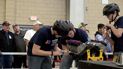 Students show off their skills in auto service.