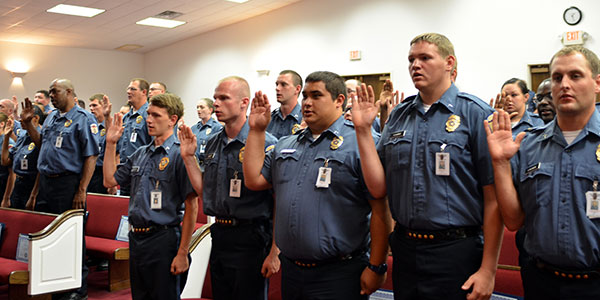 41 graduating cadets at Healdton take correctional officer oath.