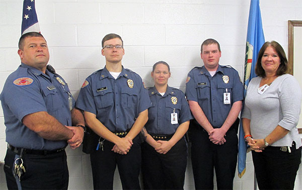 Chief of Security Shawn Price promoted Cpl. Jonathan Spencer, Cpl. Melissa Wiggins and Cpl. Alex Huff to sergeant Nov. 3. 