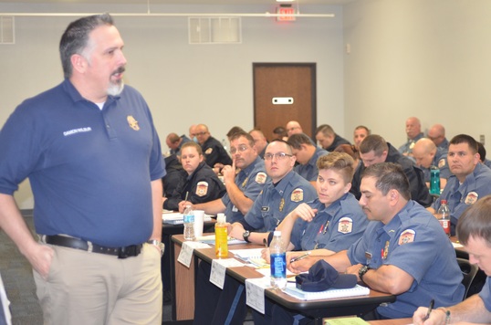 Recruits listening to classroom instruction during the first week of correctional officer training at the Wilson Training Center.