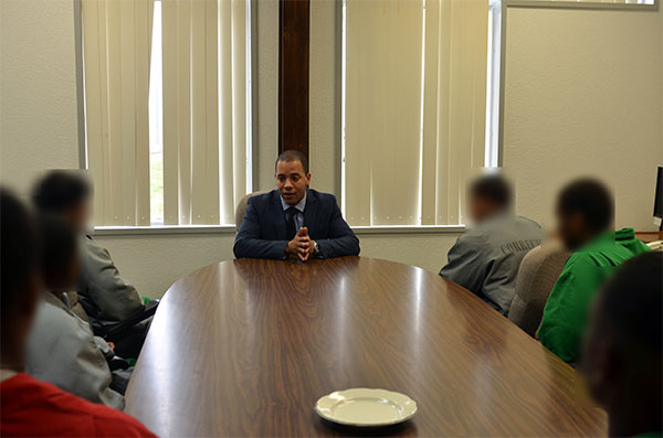 Xavier McElrath-Bey speaking with JHCC youthful inmates 