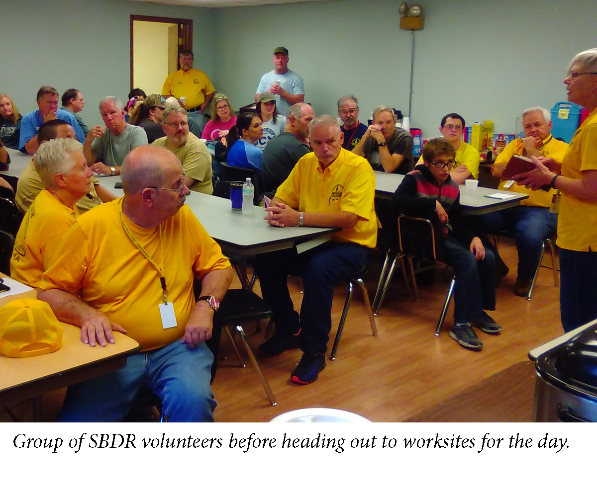 Group of SBDR volunteers before heading out to worksites for the day. 