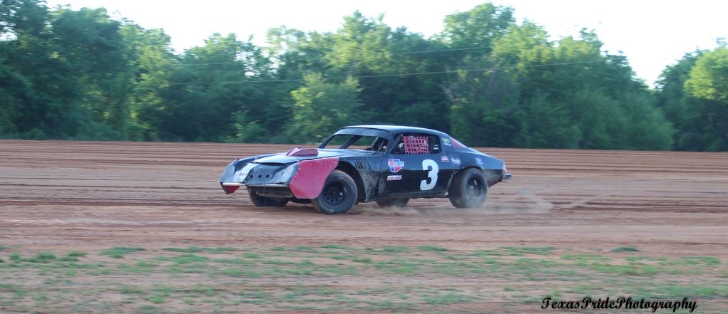 Brandi Graham-Martinez racing her Camaro at eh Kiamichi Mountain Speedway.