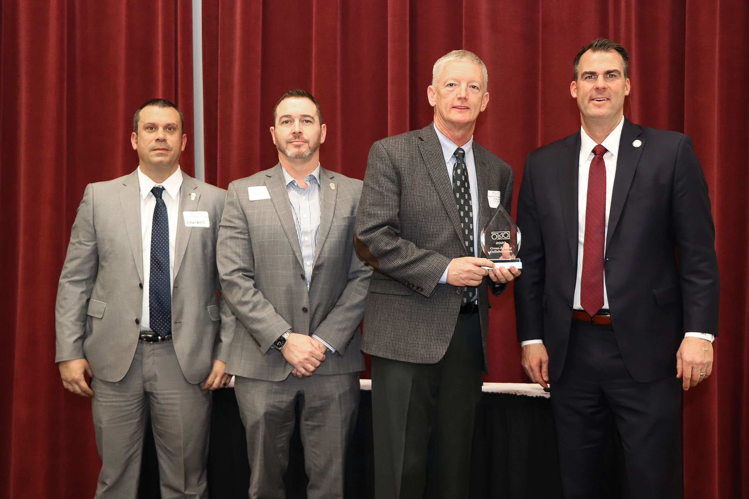 ODOC leadership accept Cross-Agency Collaboration Award from Gov Stitt