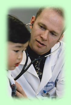 young boy getting exam well child check up