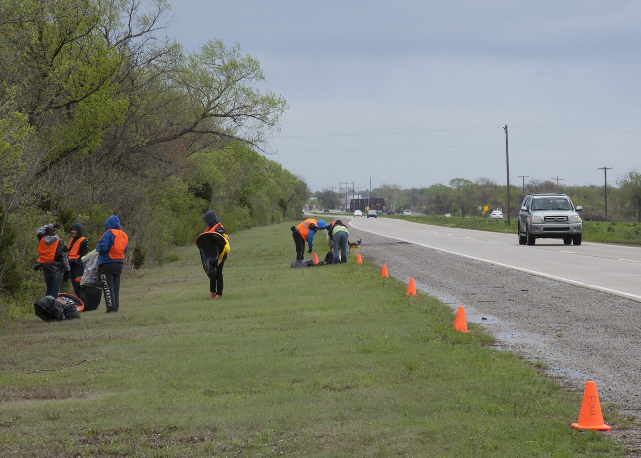 Volunteer litter removal alongside a highway