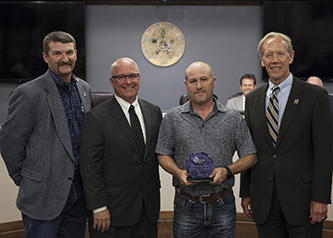 The Progressive Excellence Award recognizes the ODOT field division with the most improved safety rating. Pictured from left are Division Two Engineer Anthony Echelle, Commission Chairman David Burrage, Division Two Safety Manager W.F. Grammar and ODOT Executive Director Mike Patterson. Counties in Division 2 include Atoka, Bryan, Choctaw, Latimer, LeFlore, McCurtain, Marshall, Pittsburg and Pushmataha.