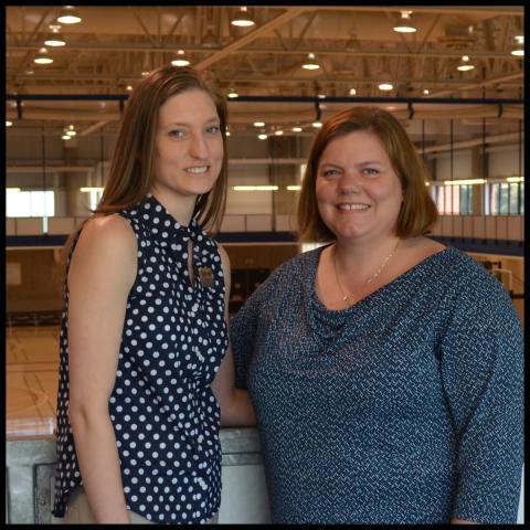 Two women in a gymnasium