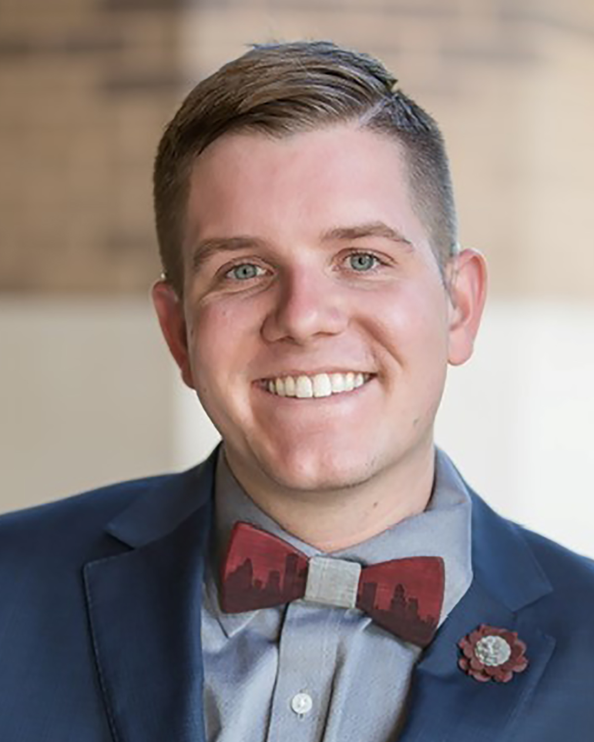 Smiling young man wearing bow tie