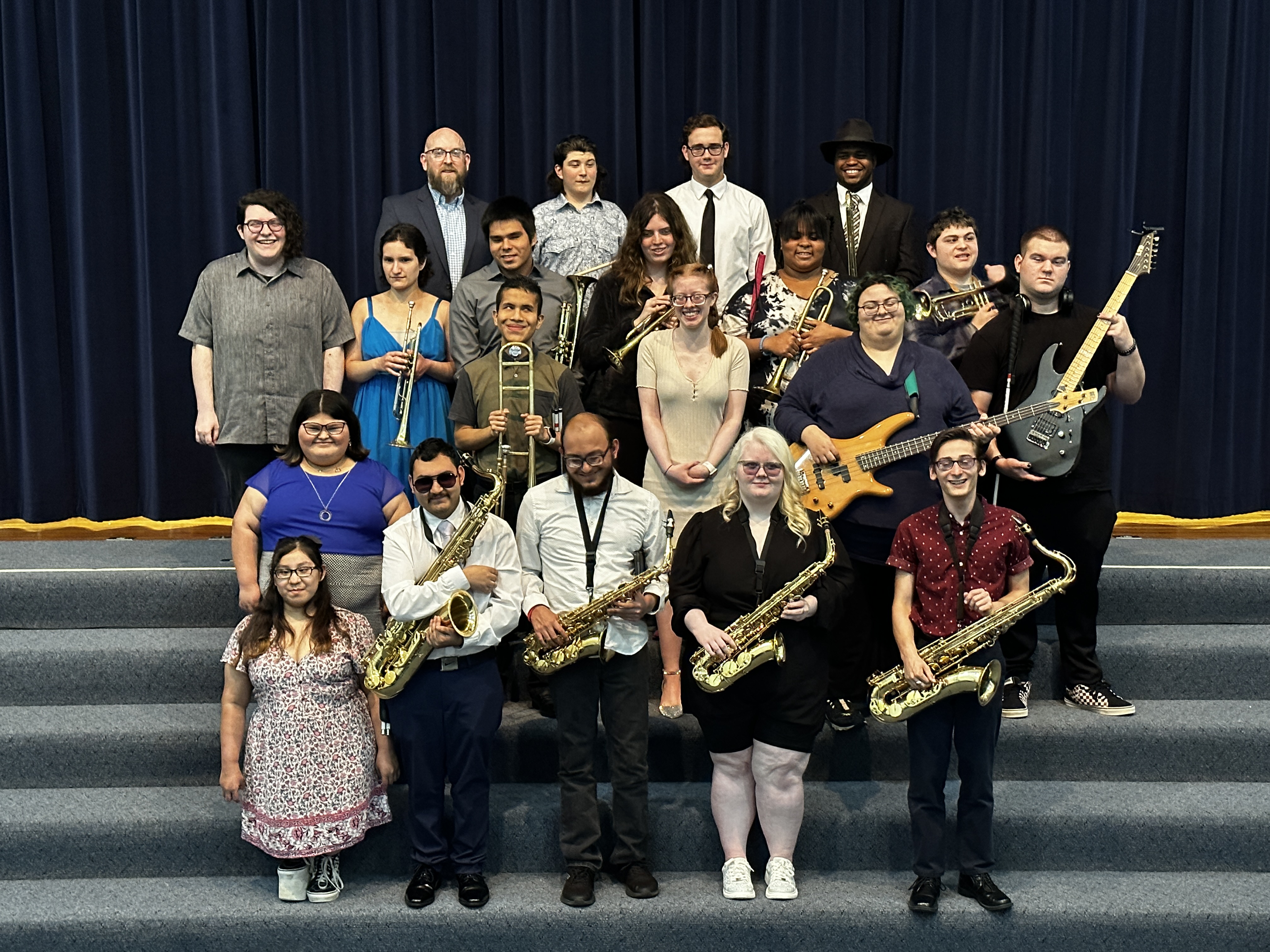 Students with instruments. 