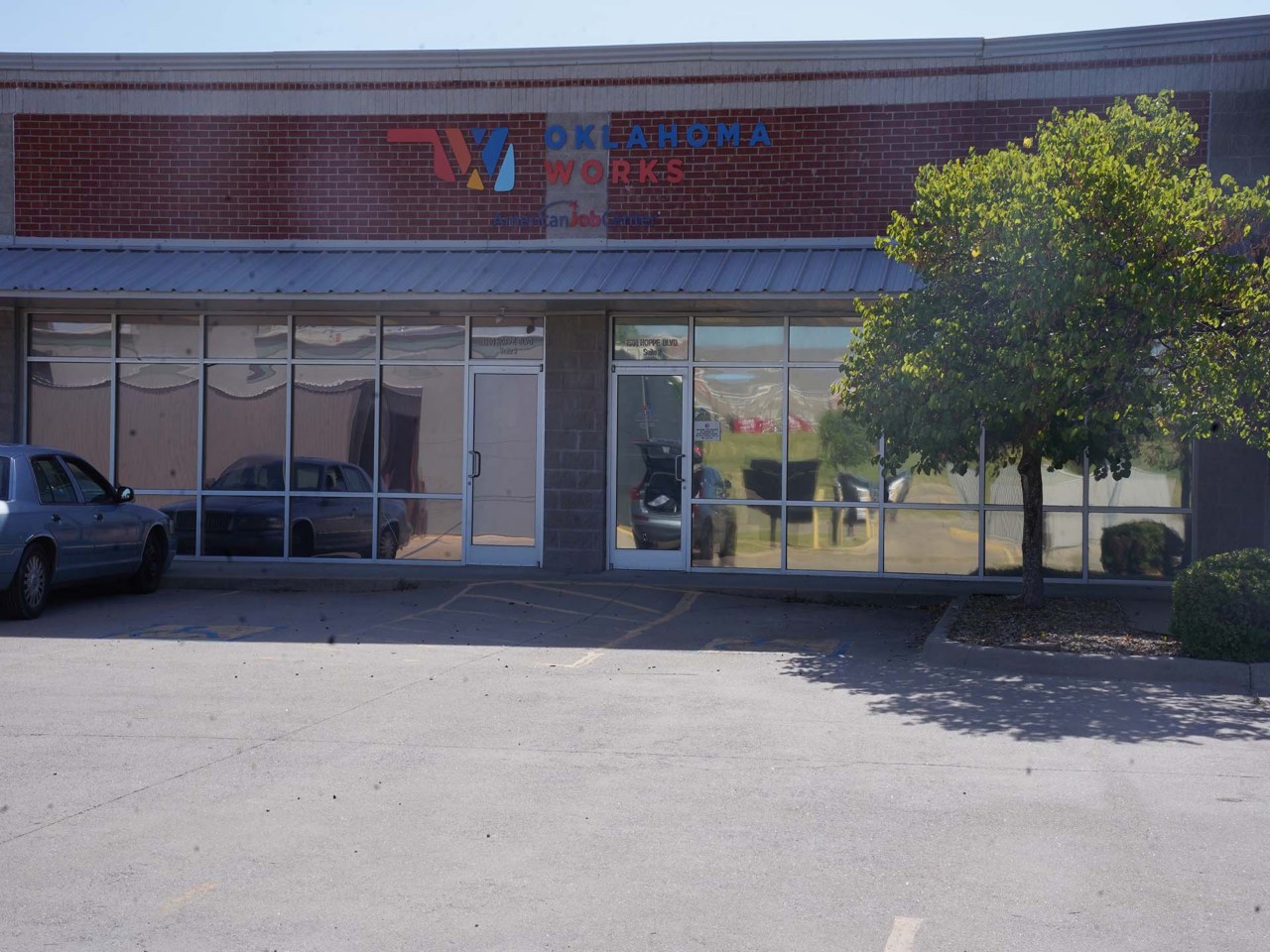 Office exterior view from the street or parking area. 