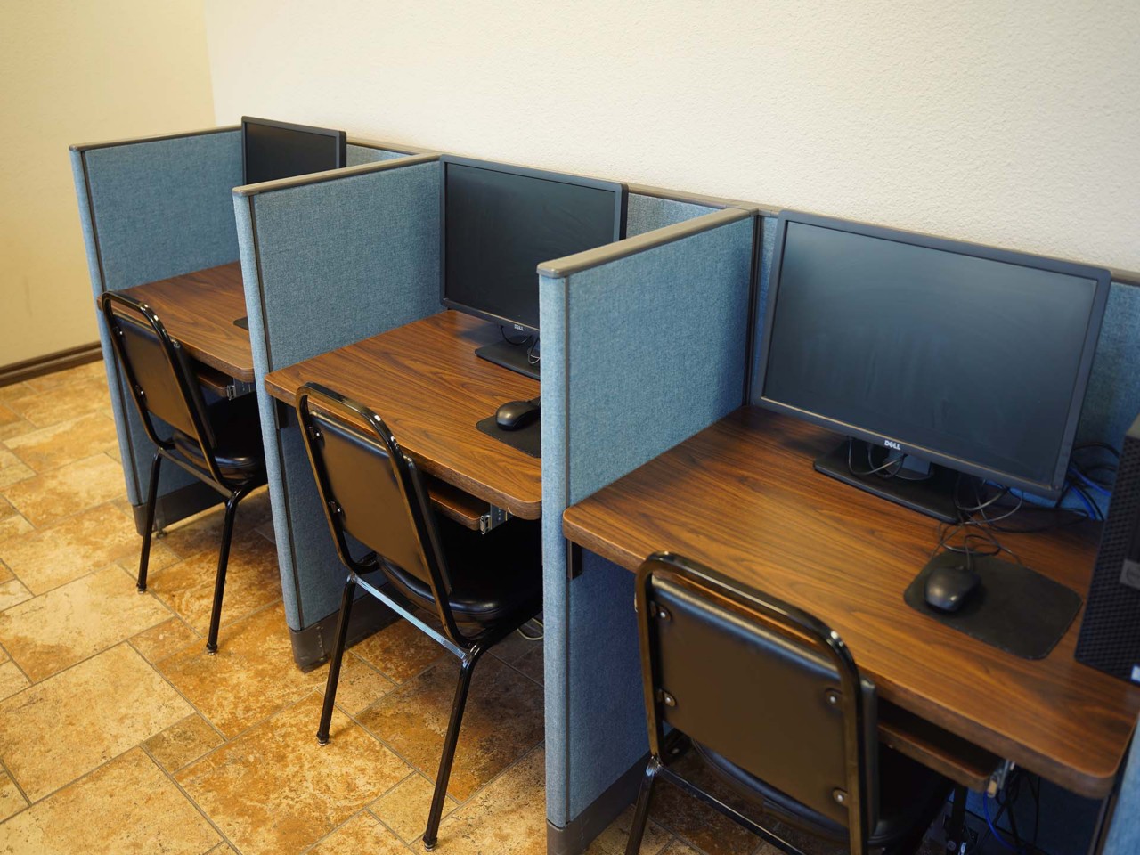 Resource area with computers and a printer/scanner/fax available to the public.             