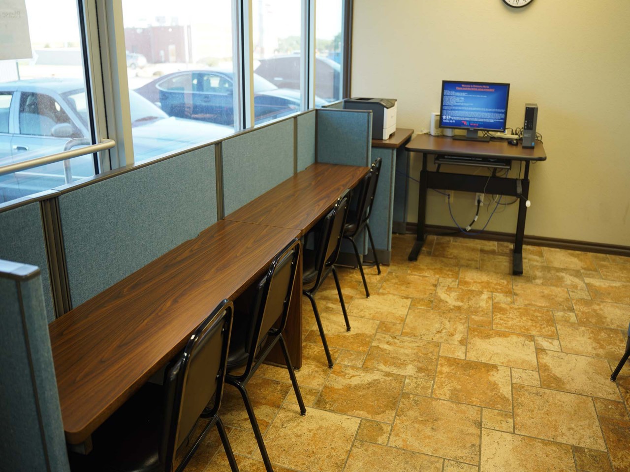 Resource area with computers and a printer/scanner/fax available to the public.  