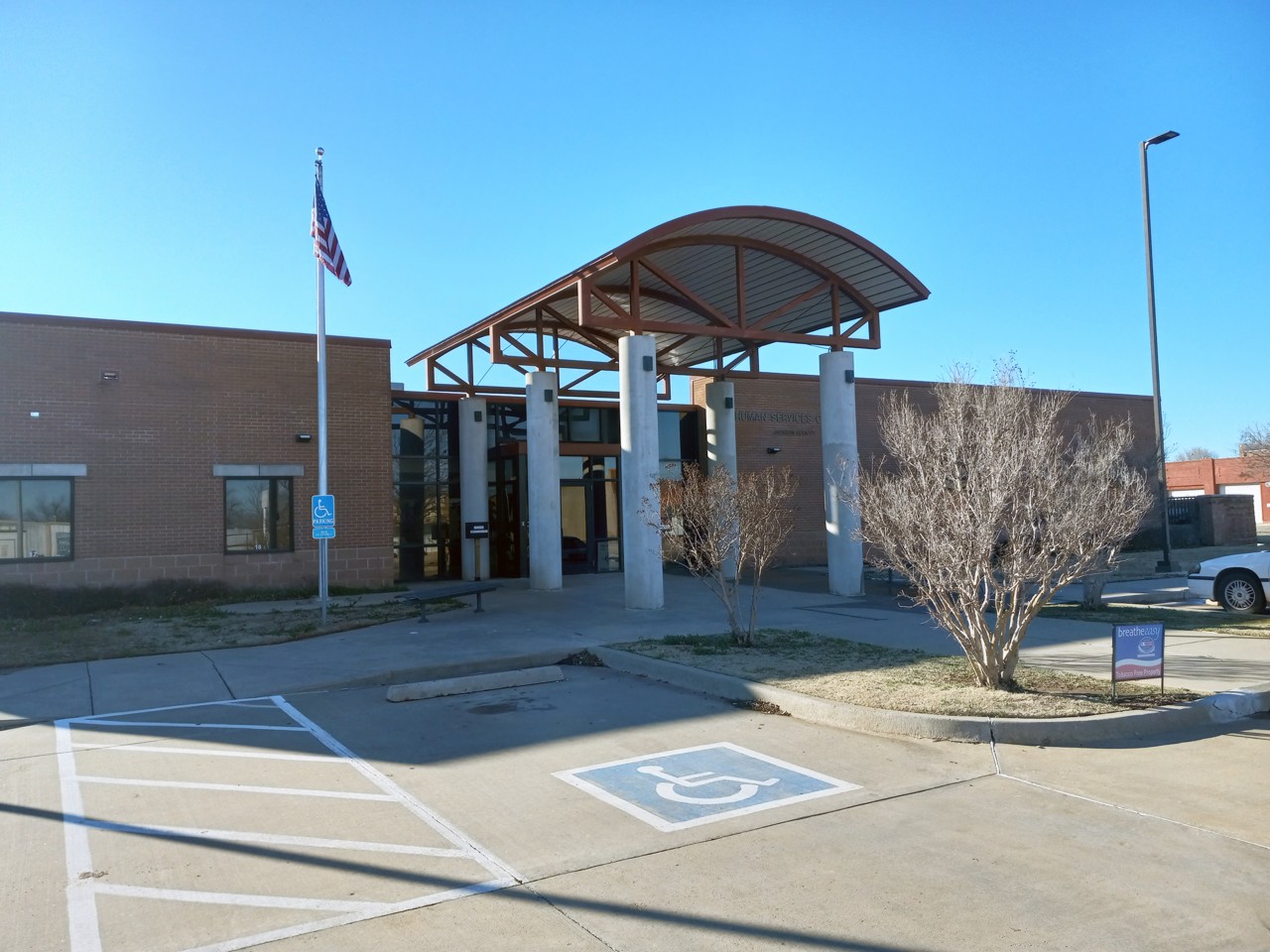 Office exterior view from the parking area.          