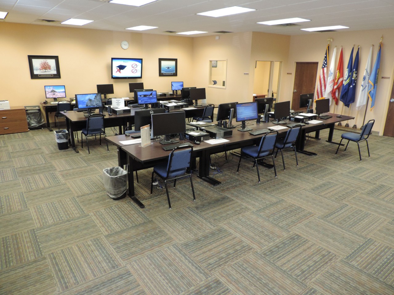 Resource area with computers and a printer/scanner/fax available to the public.