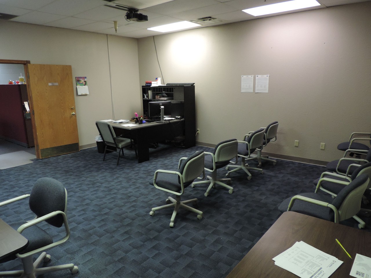 Office interior and front desk reception area after entering main entrance to building.