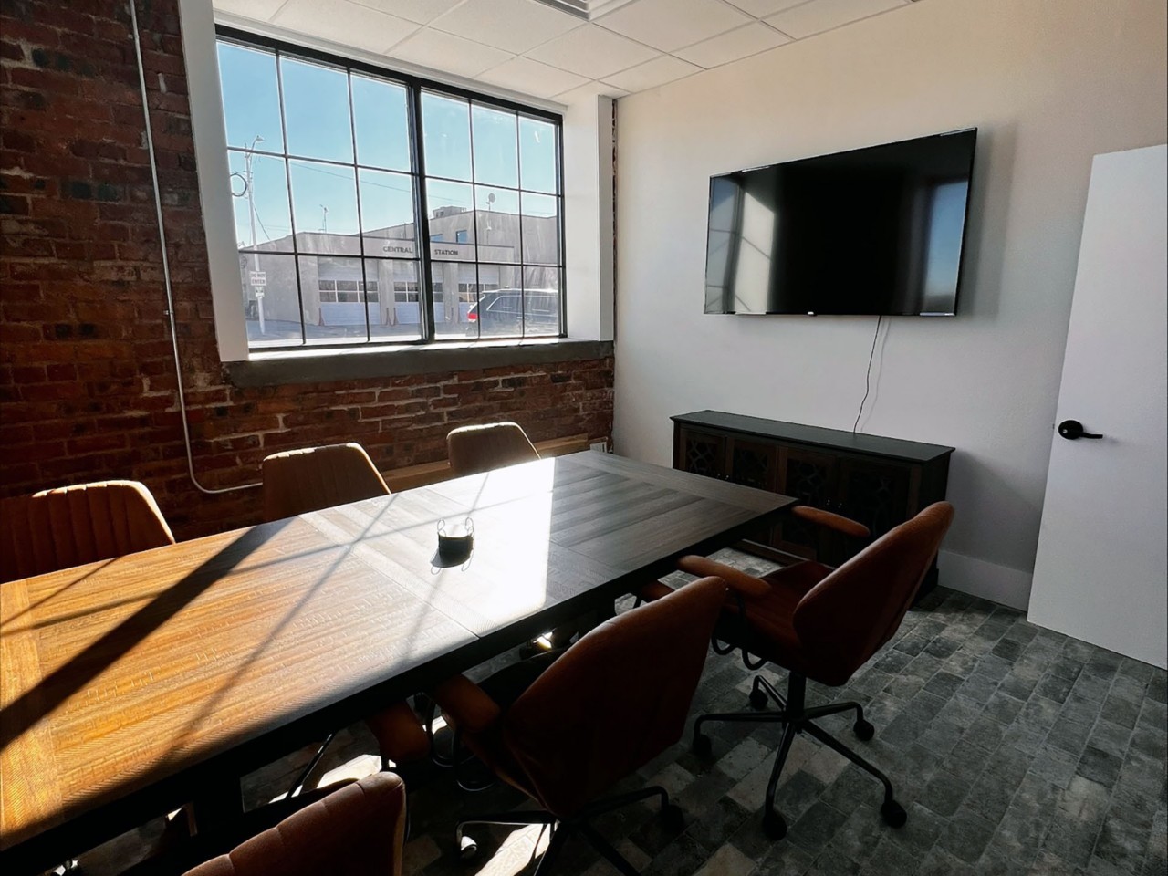 Conference or training room with available TV and table/chairs.          
