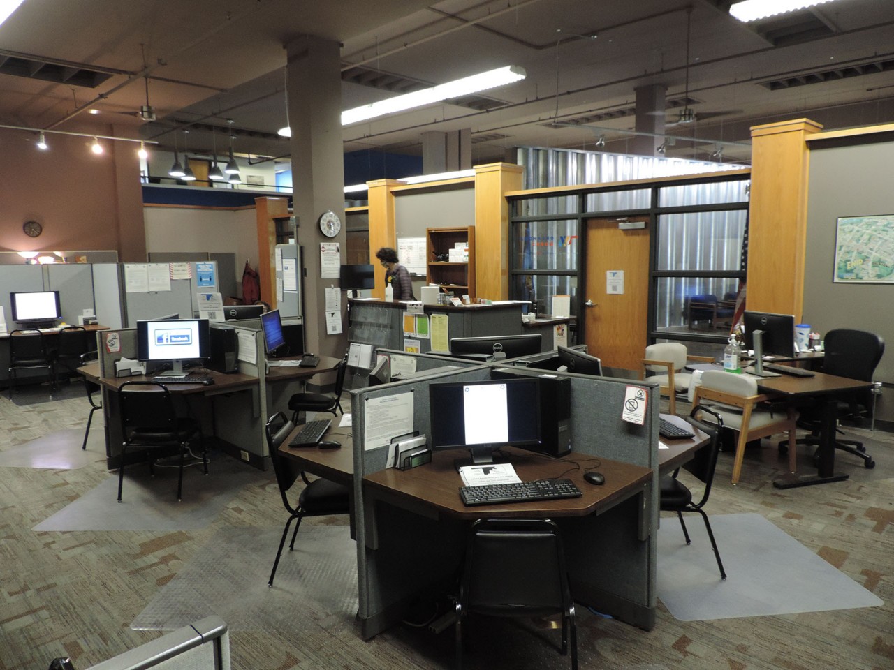 Resource area with computers and a printer/scanner/fax available to the public.