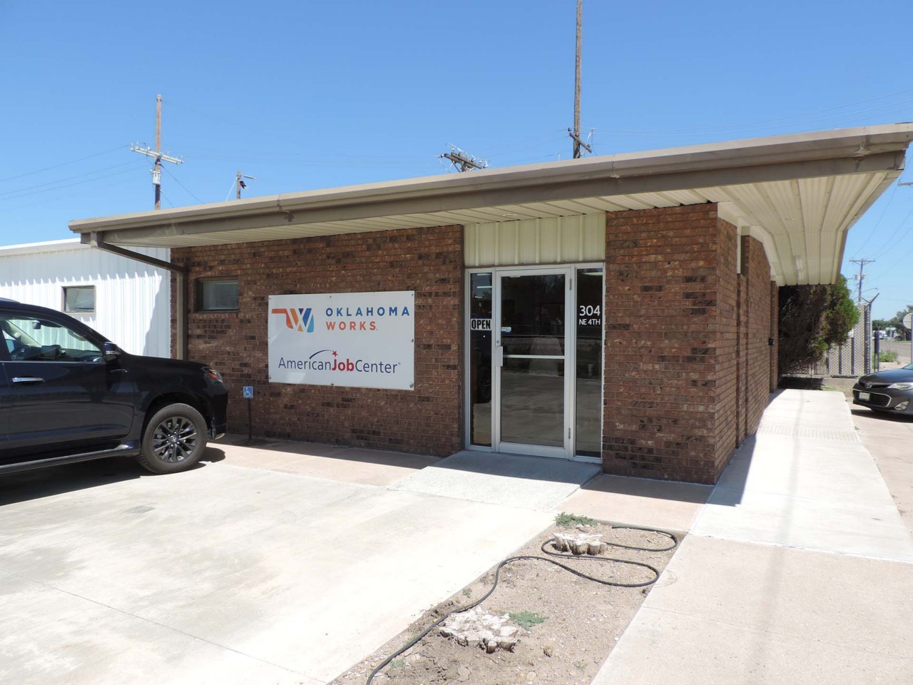 Office exterior view from the parking area.          