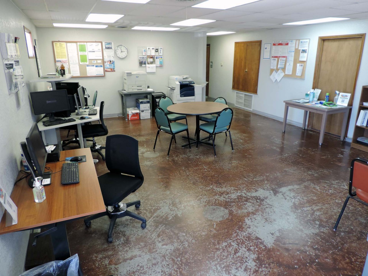 Resource area with computers and a printer/scanner/fax available to the public.          