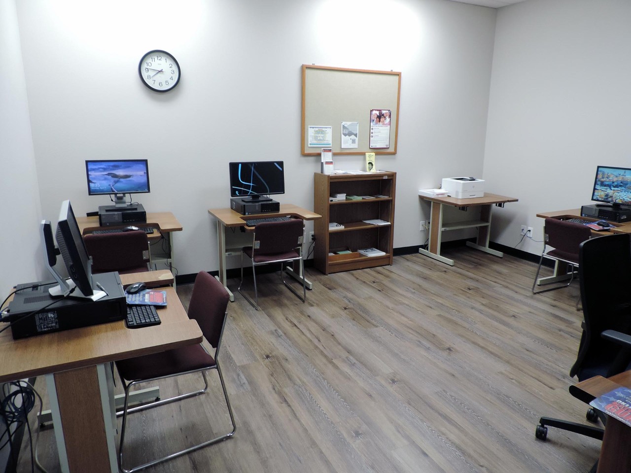 Training or testing room with available computers and printer.          