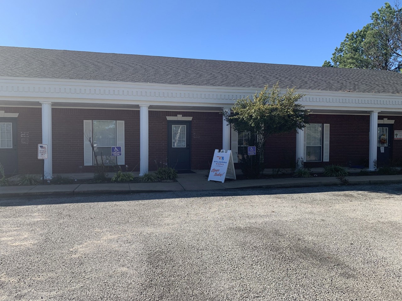 Office exterior view from the street or parking area.