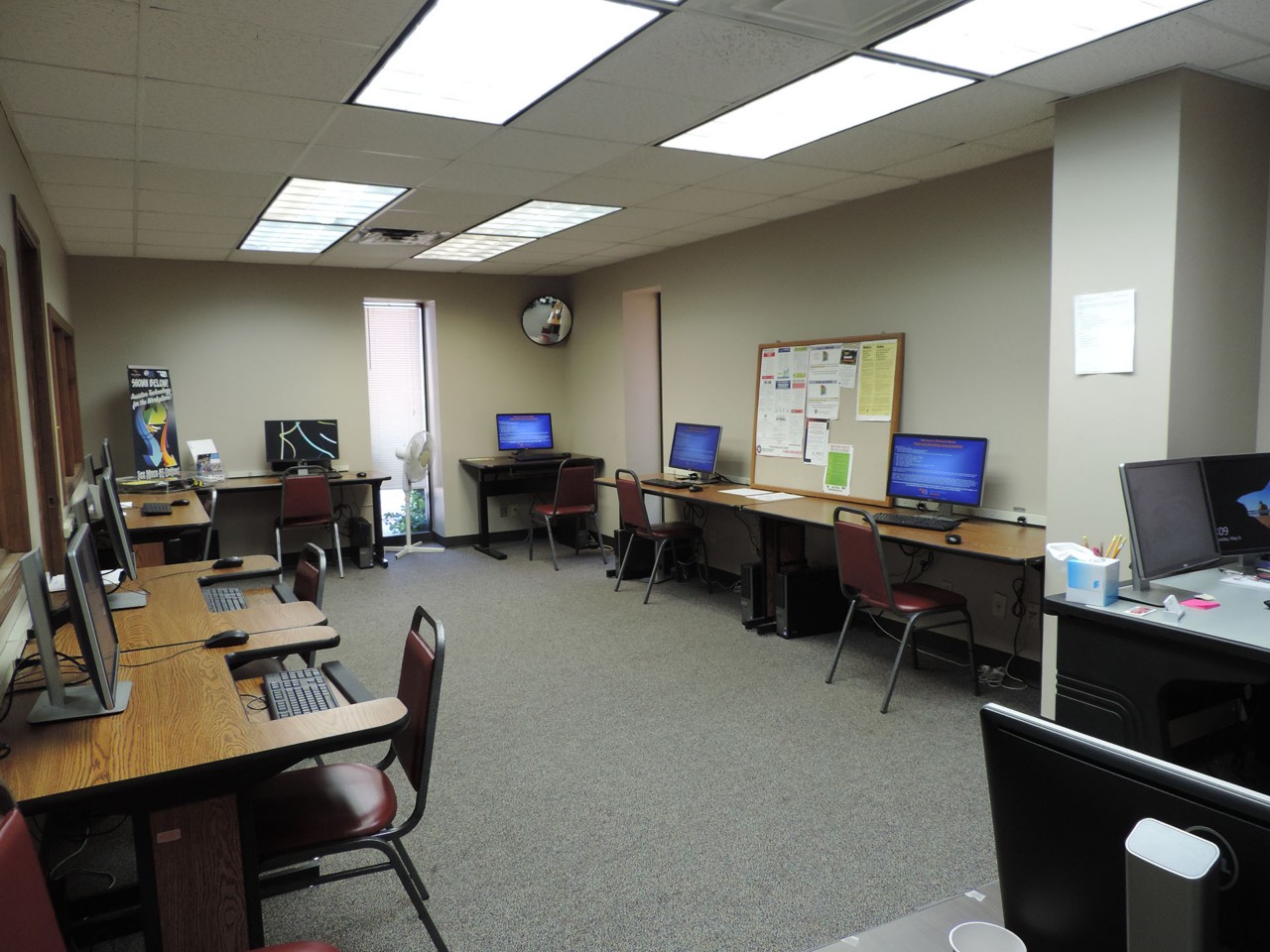 Resource area with computers and a printer/scanner/fax available to the public.