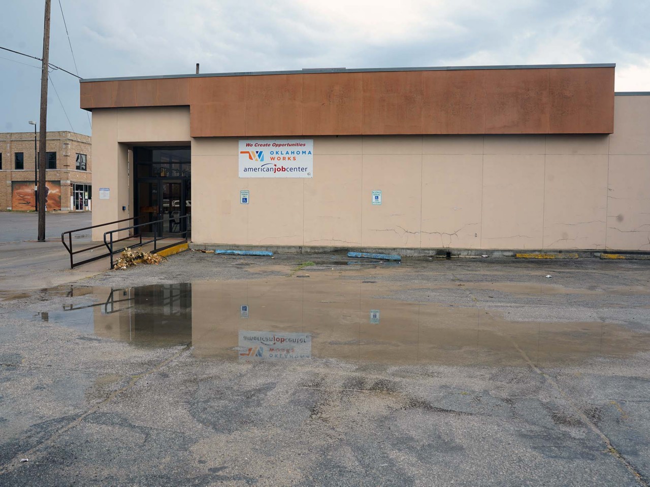 Office exterior view from the street or parking area.                               