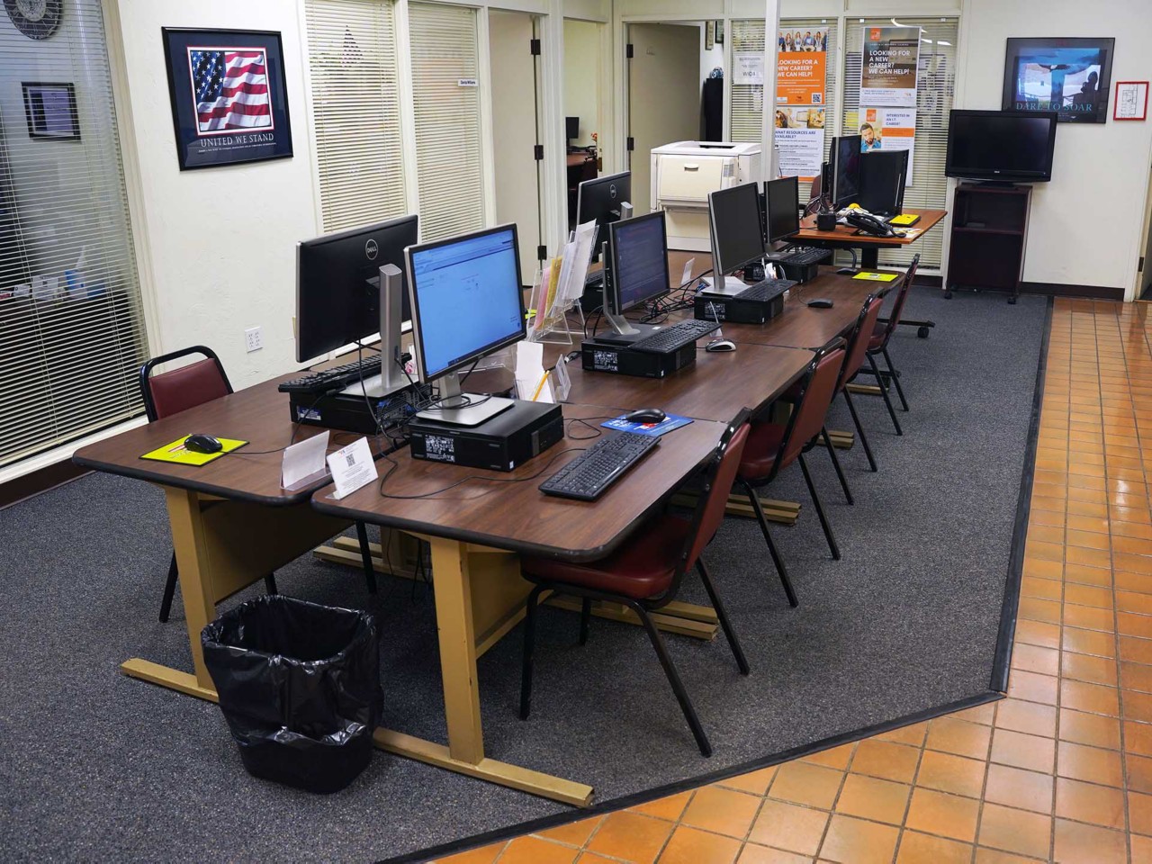 Resource area with computers and a printer/scanner/fax available to the public.                              