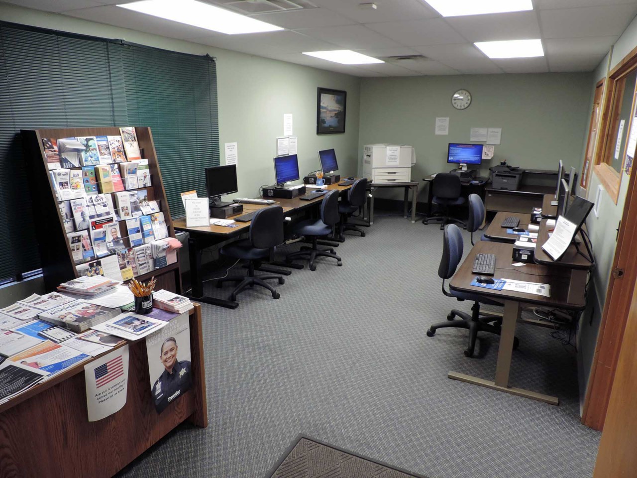 Resource area with computers and a printer/scanner/fax available to the public.