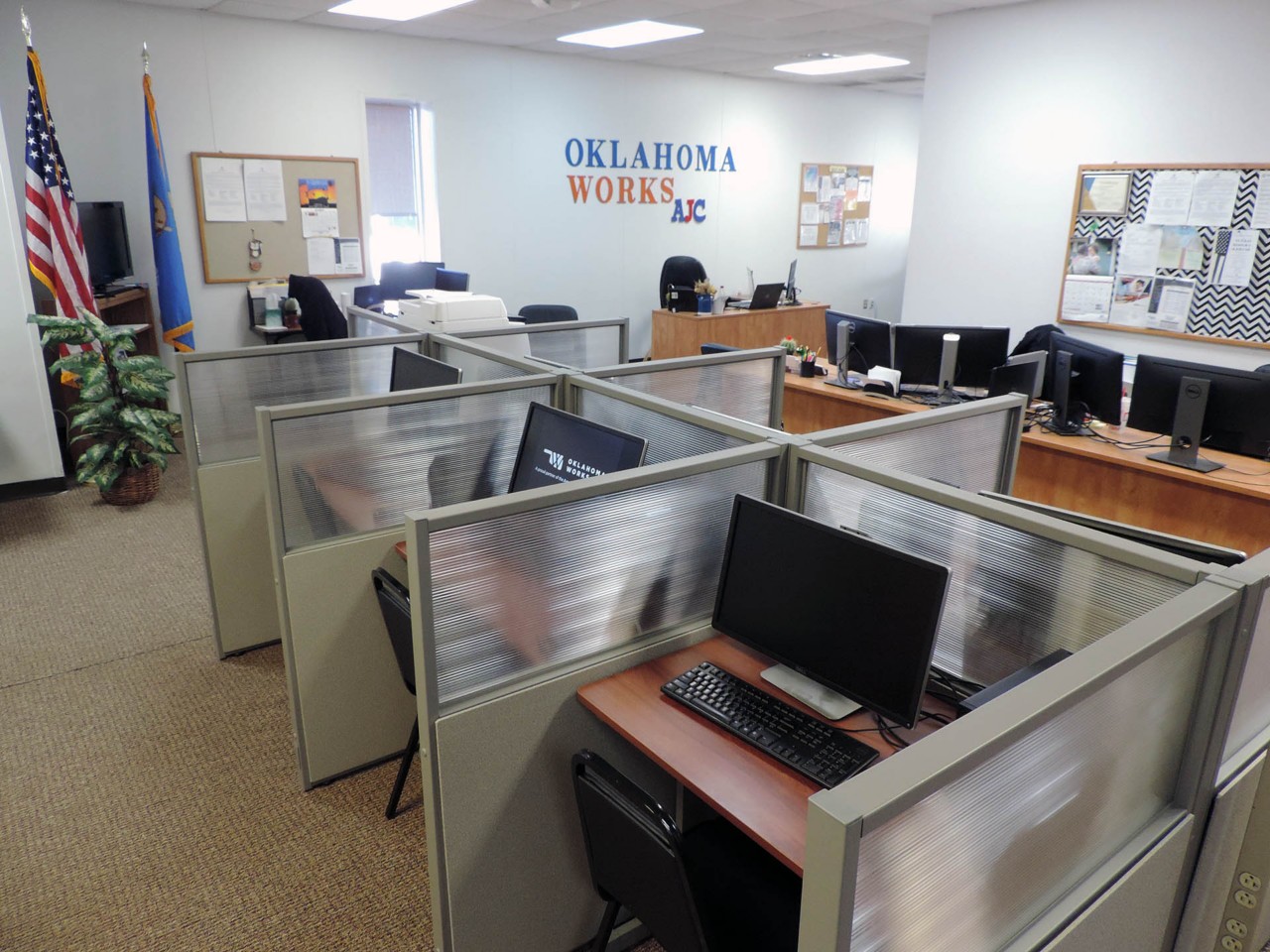 Resource area with computers and a printer/scanner/fax available to the public.          